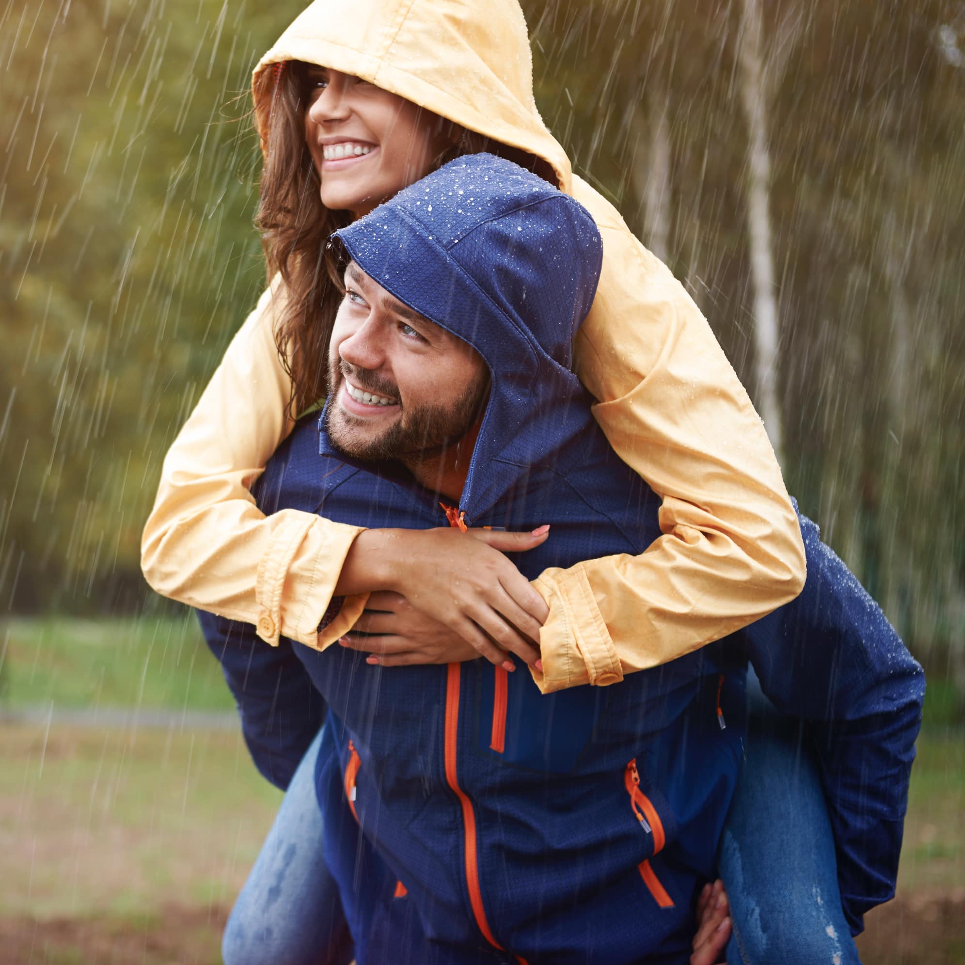 decorative image of two happy people in the rain. Image by gpointstudio on Freepik 